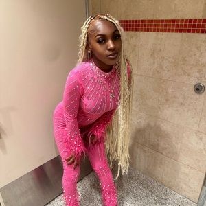 Pink one piece jumpsuit with pearls